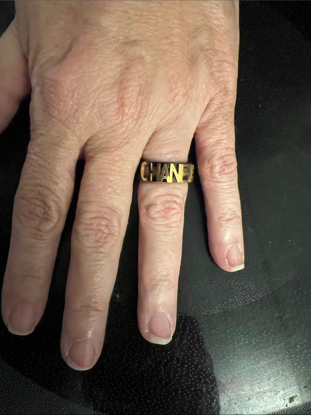 CHANEL Black and Gold Logo Band Ring Size 9